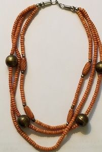 Shell and brass necklace